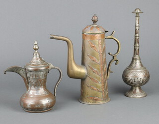 An Eastern copper and brass coffee pot, a Lebanese coffee pot the base marked Lebanon 19cm and a rose water sprinkler 25cm 