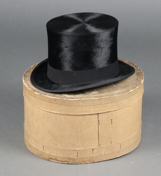 Christie, a gentleman's black top hat, size 7, complete with cardboard box 