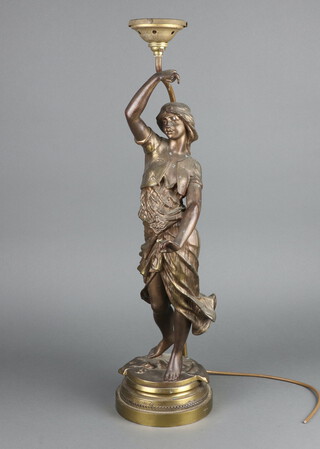 A 19th Century gilt spelter figure Salome raised on a circular base 68cm h (1 finger missing) converted to a table lamp