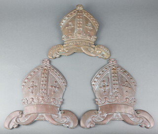 Three 19th/20th Century cast metal badges "The International Tea Company"  in the form of Bishops mitres, 1 with motto, 29cm h x 27cm  