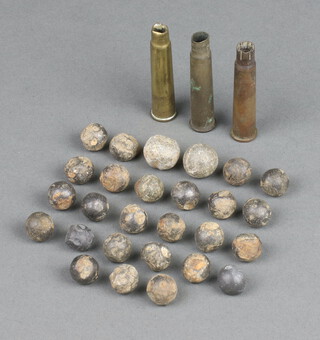 27 various musket balls together with 3 rifle cartridges