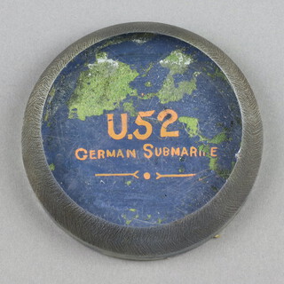 Of U-Boat interest, a circular glass paperweight marked U.52 German submarine, the edge marked Presshart Glas 3cm x 9cm 