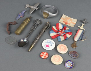 A gilt metal and enamelled triple alliance 1914 badge, a silver spoon marked Sargent's Mess Royal Military college, together with other badges, curios etc 