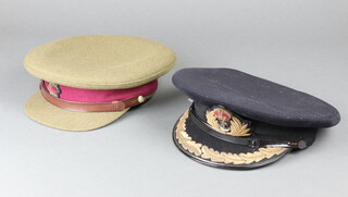 Hawkes & Company, a Second World War Brigadier's cap (small moth hole to the peak) and a Gieves WWII Royal Navy Commander's peak cap 