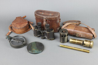 Sherwood and Company London, a pair of binoculars Prismatic no.2 Mark 2 in original leather carrying case, a H Hughes & Sons Ltd compass in leather carrying case labelled Captain A C Basebee D Company Fifth Middlesex HG and 1 other instrument in oval leather case  