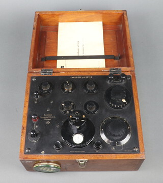 A Cambridge PH meter in an oak case and test certificate dated 1965 