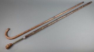 A bamboo horse measuring stick with silver collar marked "Won by Dicebox", together with a walking cane 