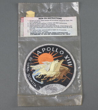An American Apollo XIII souvenir space embroidered badge, in original packaging, 9cm 