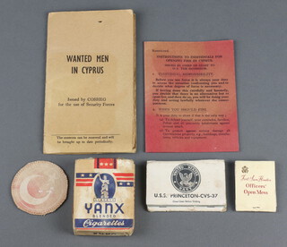 A 1950's pamphlet "Wanted Men in Cyprus" (slight tear) together with "Instructions to Individuals for Opening Fire in Cyprus", a cloth badge, packet of Yanx cigarettes, a USS Princeton-CVS-37 match book and 1 other 