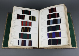 An album of 19th/20th Century fabric samples, approximately 470, contained in a leatherette bound volume 