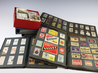 Four albums of cigarette cards, an album of match box covers and a collection of loose cigarette cards