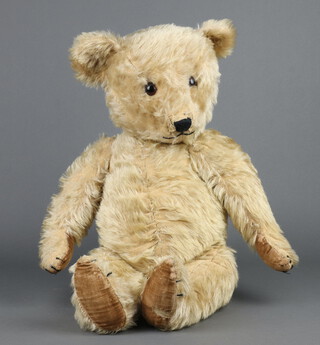 A Mohair teddy bear with articulated limbs 58cm 