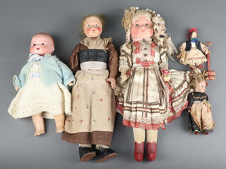 A collection of 5 Victorian and later dolls to include 2 paper mache 34cm l, 1 bisque Armand Marseille marked AM Germany 351/3/OK 25cm l and a porcelain miniature doll 12cm l 