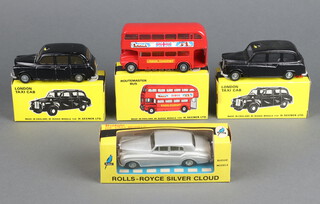 Budgie Toys, a collection of 4 boxed die cast cars to include Routemaster Bus 236, Rolls Royce Silver Cloud 102 and 2 London Taxi Cabs 101  