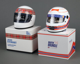 Jackie Stewart, a half scale Formula 1 helmet of his 1970 Elf Team World Championship campaign, signed by Jackie Stewart, boxed, together with a similar 1994 edition helmet signed by Martin Brundle