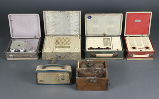 A collection of portable suitcase valve radios by Pye, Vidor and Marconi, together with an Ekco transistor radio