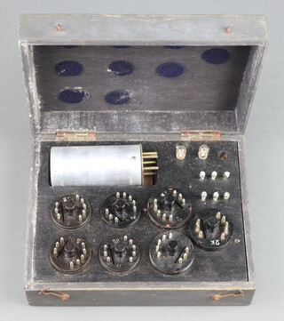A German military radio spare valve box containing Telefunken ECH11, EDD11, EBC11, EF13, EF13, EF12, EZ11 valves