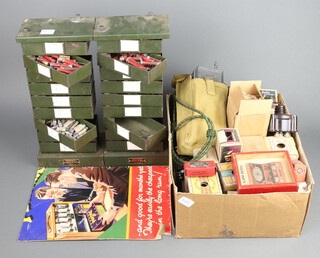 A mixed box of radio related items including 26 valve bases, valve boxes some with valves, an o/c Amplion horn driver, a Binatone portable CB radio, together with a metal swing tray cabinet with a large number of early dogbone resistors and other components