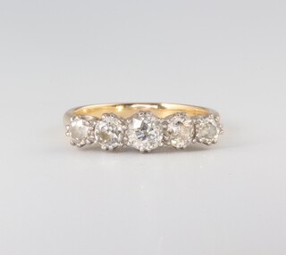 A yellow metal 18ct 5 stone diamond ring size O 1/2, approx 1.2ct, 4.2 grams 