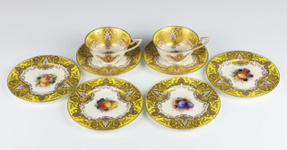 Two Royal Worcester cups (1 marked W H Austin) and saucers decorated with fruits together with 4 side plates C1608 (1 marked W H Austin)
