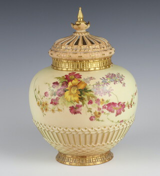 A Royal Worcester blush porcelain pot pourri and cover, the body decorated with spring flowers and basket work detail 1286 26cm 