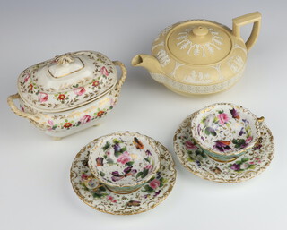 A pair of 19th Century Paris Porcelain cups and saucers decorated with butterflies and flowers together with a 19th Century Derby sucrier and cover and a Wedgwood Jasper teapot and cover