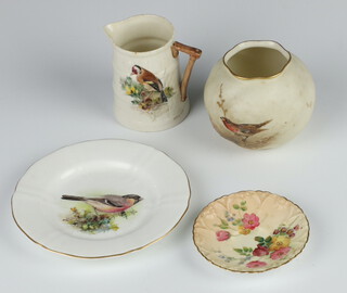 A Royal Worcester porcelain vase decorated with a robin 7cm, a ditto dish decorated with a Bullfinch 11cm (chipped), a moulded jug decorated with a Goldfinch together with a saucer 