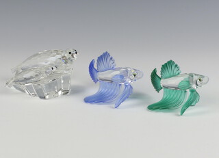 A Swarovski Crystal  green glass figure of a Japanese fighting fish 5cm, ditto blue 5cm and a seal and cub etched 21NS1 5cm, all boxed 