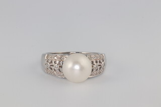 A white metal 14k cultured pearl and diamond ring, size P 1/2, 5 grams 