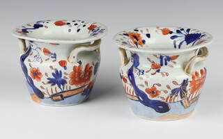 A pair of 19th century Ironstone 2 handled vases decorated with stylised flowers 11cm 