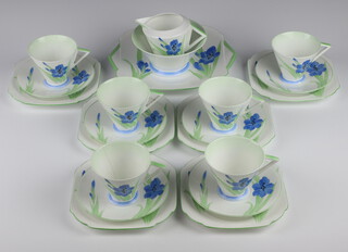 An Art Deco Shelley tea set number 19961 comprising 5 tea cups (2 a/f), 6 saucers, 6 small plates, sandwich plate and milk jug, decorated flowers 