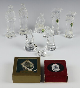 A set of Waterford Crystal Nativity figures comprising Mary, Joseph and Jesus and 5 attendants, together with 2 Waterford Crystal Christmas decorations 