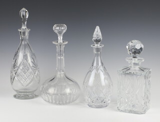 A cut glass square spirit decanter and stopper and 3 mallet shaped ditto 