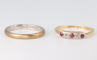 A yellow metal 18ct ruby and diamond ring together with a platinum wedding band sizes O and M, 3.6 grams 