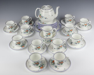 A Shelley Idalium pattern tea set comprising teapot (lid chipped), 12 tea cups (4 cracked), 12 saucers (3 cracked), 12 side plates, 2 sandwich plates, milk jug, sugar bowl (chipped)