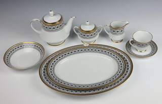 A Noritake Scheherazade no.2044 tea and dinner service comprising 8 tea cups (1 a/f), 8 saucers, 2 milk jugs, a tea pot, sugar bowl and lid, 12 small plates, 9 side plates (1 a/f), 10 dinner plates (1 a/f), 9 soup bowls, 14 dessert bowls, 2 meat plates (1 a/f), 2 vegetable dishes 