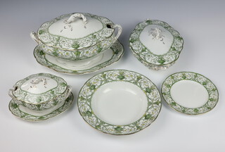 A Doulton Burslem Selborne dinner service comprising 24 small plates (2 a/f), 11 dessert plates (3 a/f), 23 side plates (3 a/f), 11 dinner plates, 12 soup bowls, a soup tureen, cover and stand, 3 vegetable tureens and 2 covers, 2 sauce tureens and stands and 1 cover, 4 oval serving plates (1 a/f), 4 oval meat plates (1 a/f) 