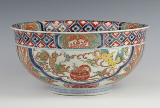 A 19th Century Chinese deep Imari bowl decorated with panels of dragons and flowers 25cm 