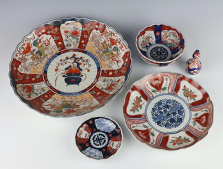 A Chinese Imari scallop shaped dish decorated with panels of dragons and flowers 31cm, a ditto dish 22cm, another 11cm and a deep bowl 13cm 