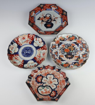 A 19th Century Imari shell shaped dish decorated with panels of flowers 21.5cm, the reverse decorated with bats, a scallop shaped ditto decorated with flowers 21cm, a round ditto 21cm and an octagonal plate decorated a vase of flowers 24cm 