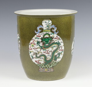 An 18th Century style green ground oviform jardiniere decorated with vases bearing a 6 character mark to the base 24cm 