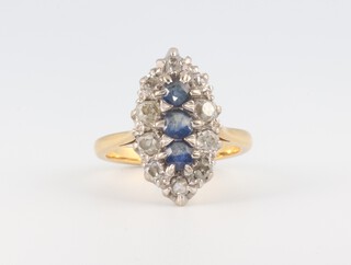 A yellow metal Edwardian sapphire and diamond marquise ring, size N 1/2, 6.2 grams 