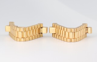 A pair of French Mecan Elde yellow metal Rolex bracelet style stirrup cufflinks, 20.5 grams 