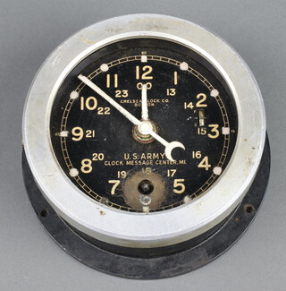 Chelsea Clock Co Boston, a ward room style timepiece with Arabic numerals, the 10cm dial marked US Army Clock Message Centre M1, marked 18, contained in a Bakelite case,  no key, 6cm x 15cm  