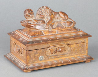 A Swiss cylinder music box playing 3 aires contained in a carved walnut box 10cm x 15cm x 9cm 