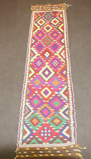 A green, purple and blue ground Suzni runner with overall diamond design 314cm x 72cm 