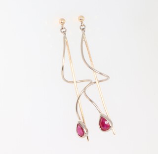 A pair of yellow metal pear cut ruby earrings 5.5cm, the rubies approx. 0.5ct each, 4.4 grams, 5.5cm long 