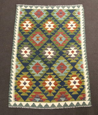 A black, white and green ground Maimana Kilim rug 144cm x 97cm 