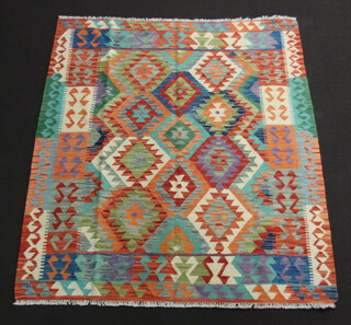 An orange, blue and turquoise ground Chobi Kilim rug with all geometric design 185cm x 153cm 