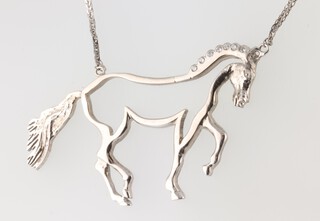 A 9ct white gold chain 36cm and a white metal diamond set horse pendant, the 7 diamonds each approx. 0.01ct, 8.5 grams gross  